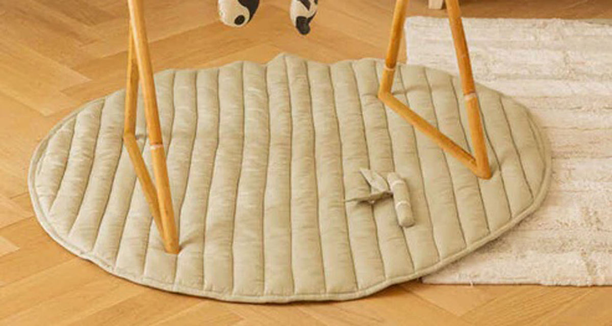 Playmat Bamboo Leaf by Lorena Canals, showing playmat bamboo leaf in live shot.
