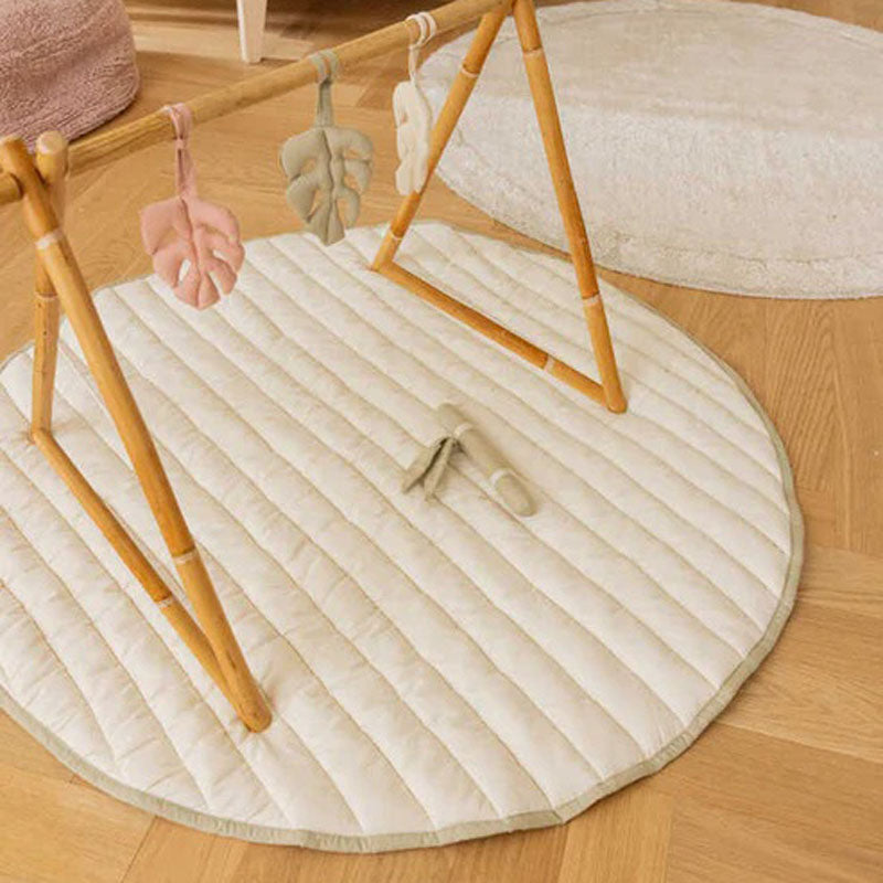 Playmat Bamboo Leaf by Lorena Canals, showing playmat bamboo leaf in live shot.