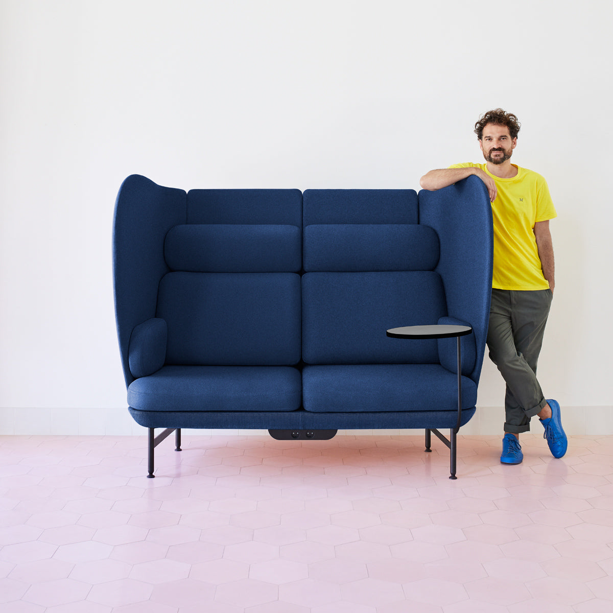Plenum Sofa by Fritz Hansen, showing plenum sofa in live shot.