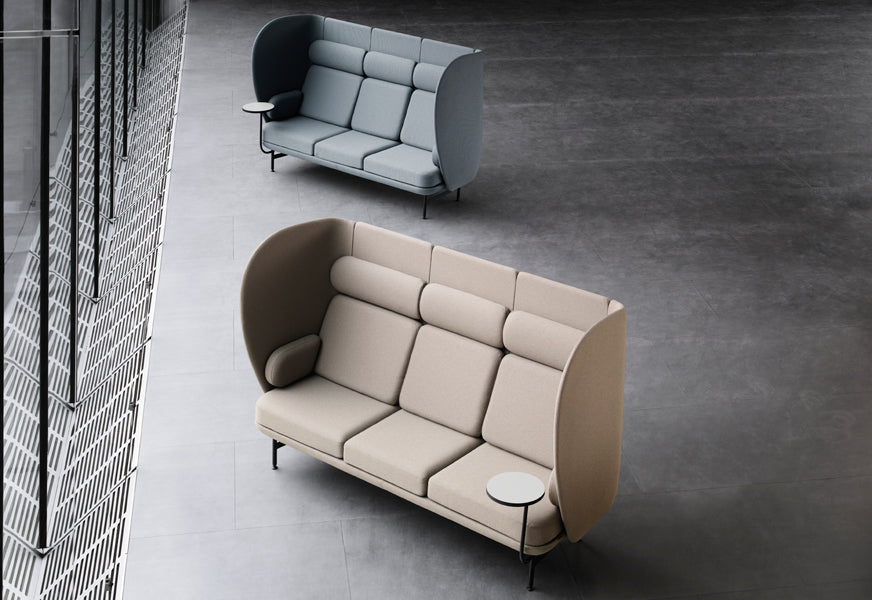 Plenum Sofa by Fritz Hansen, showing plenum sofas in live shot.