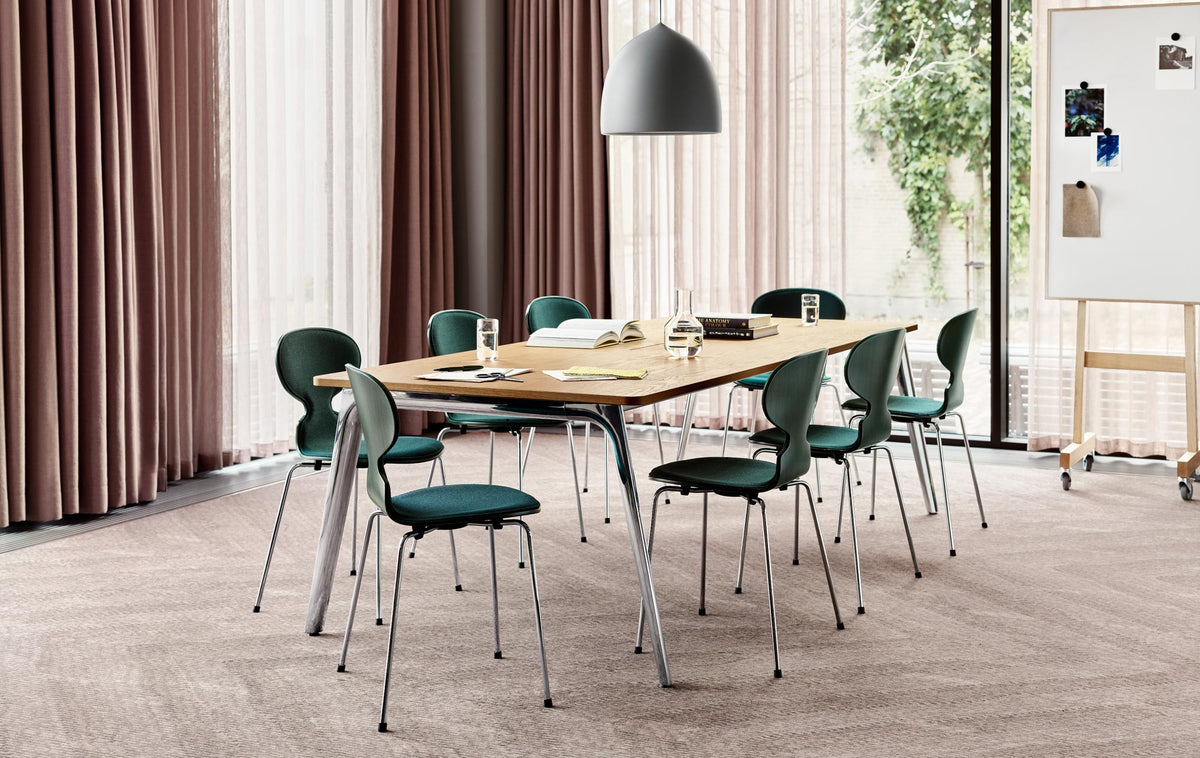 Pluralis Table by Fritz Hansen, showing pluralis table in live shot.