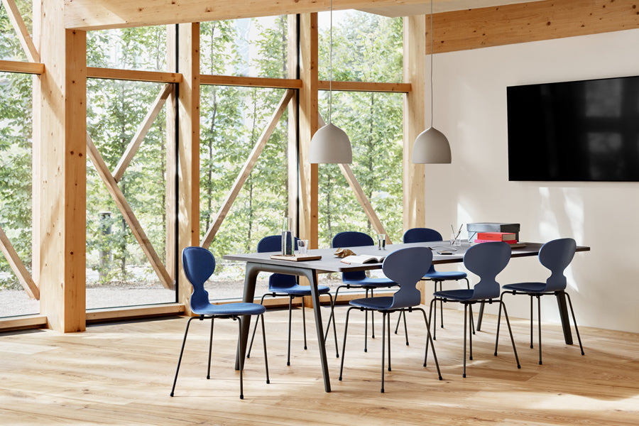 Pluralis Table by Fritz Hansen, showing pluralis table in live shot.