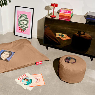 Point Recycled Cord Pouf by Fatboy, showing point recycled cord pouf in live shot.