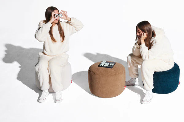 Point Recycled Cord Pouf by Fatboy, showing point recycled cord poufs in live shot.