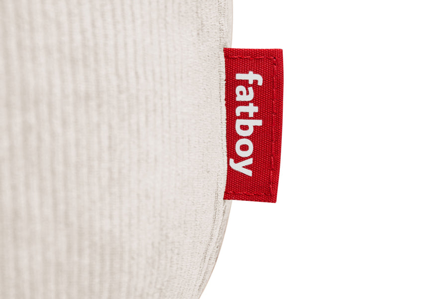 Point Recycled Cord Pouf by Fatboy, showing closeup view of point recycled cord pouf in cream polyester fabric.