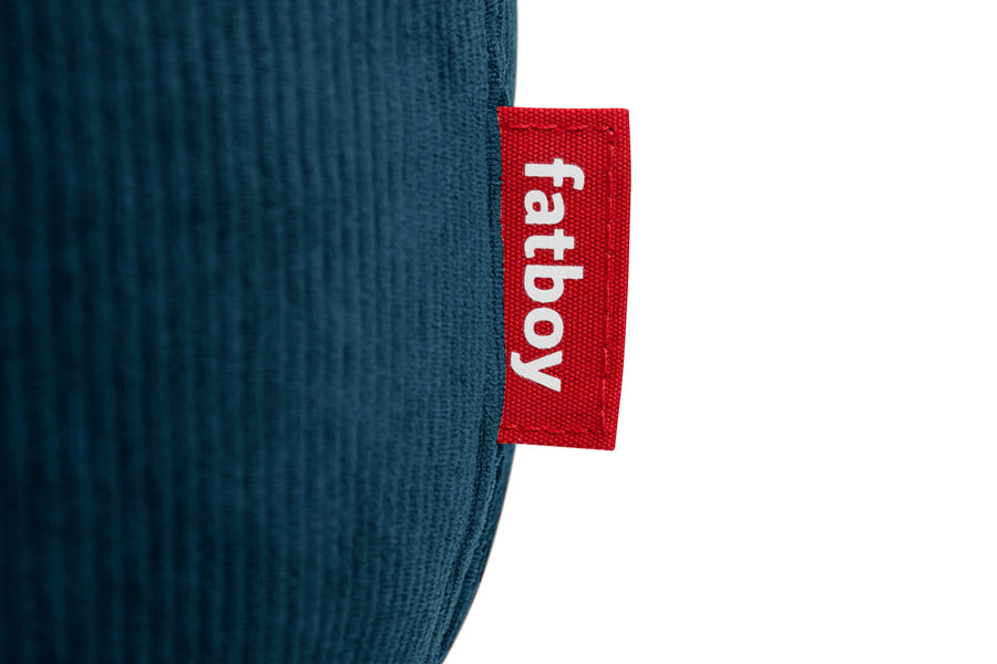 Point Recycled Cord Pouf by Fatboy, showing closeup view of point recycled cord pouf in deep blue polyester fabric.