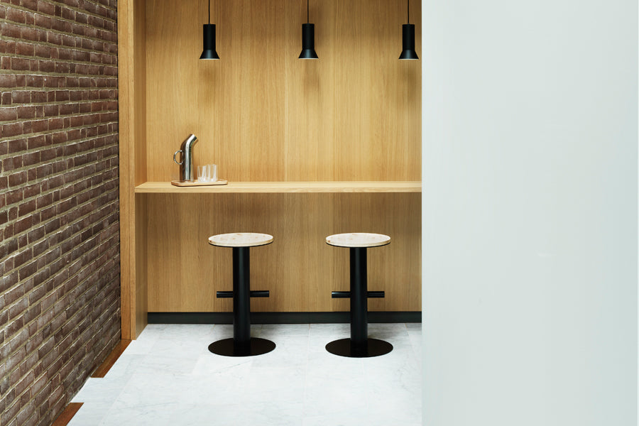 Pole Barstool by Normann Copenhagen, showing pole barstools in live shot.