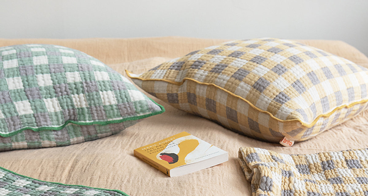 Pomme Cushion by Brita, showing pomme cushion in live shot.