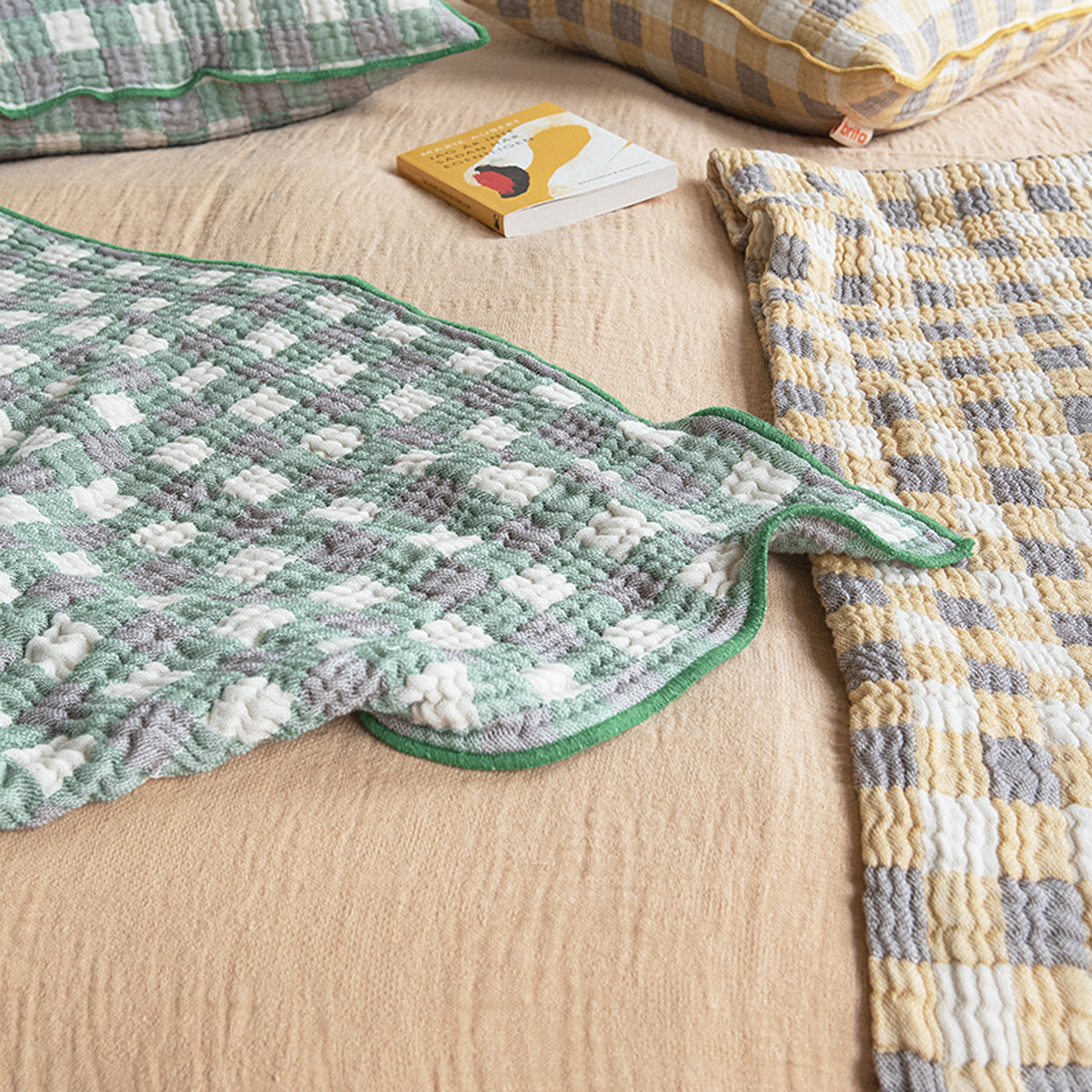 Pomme Recycled Cotton Blanket by Brita, showing pomme recycled cotton blanket in live shot.