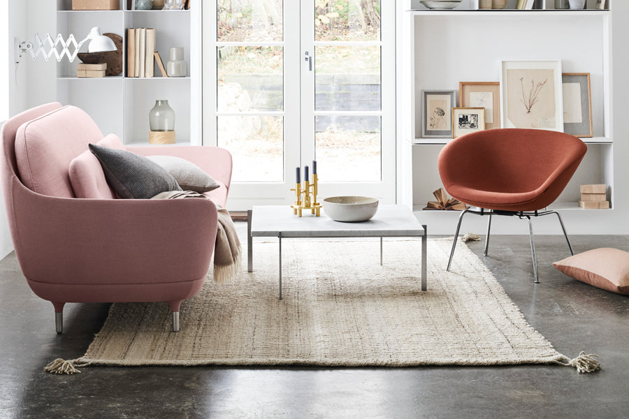 Pot Lounge Chair by Fritz Hansen, showing pot lounge chair in live shot.