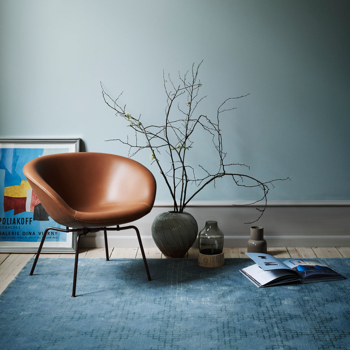 Pot Lounge Chair by Fritz Hansen, showing pot lounge chair in live shot.