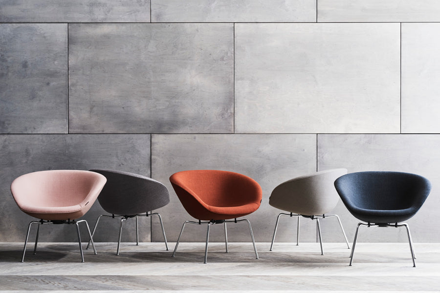 Pot Lounge Chair by Fritz Hansen, showing pot lounge chairs in live shot.