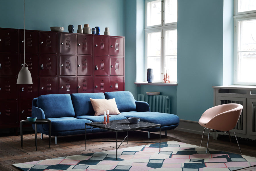 Pot Lounge Chair by Fritz Hansen, showing pot lounge chair in live shot.