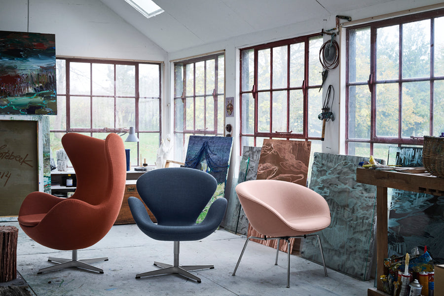 Pot Lounge Chair by Fritz Hansen, showing pot lounge chair in live shot.