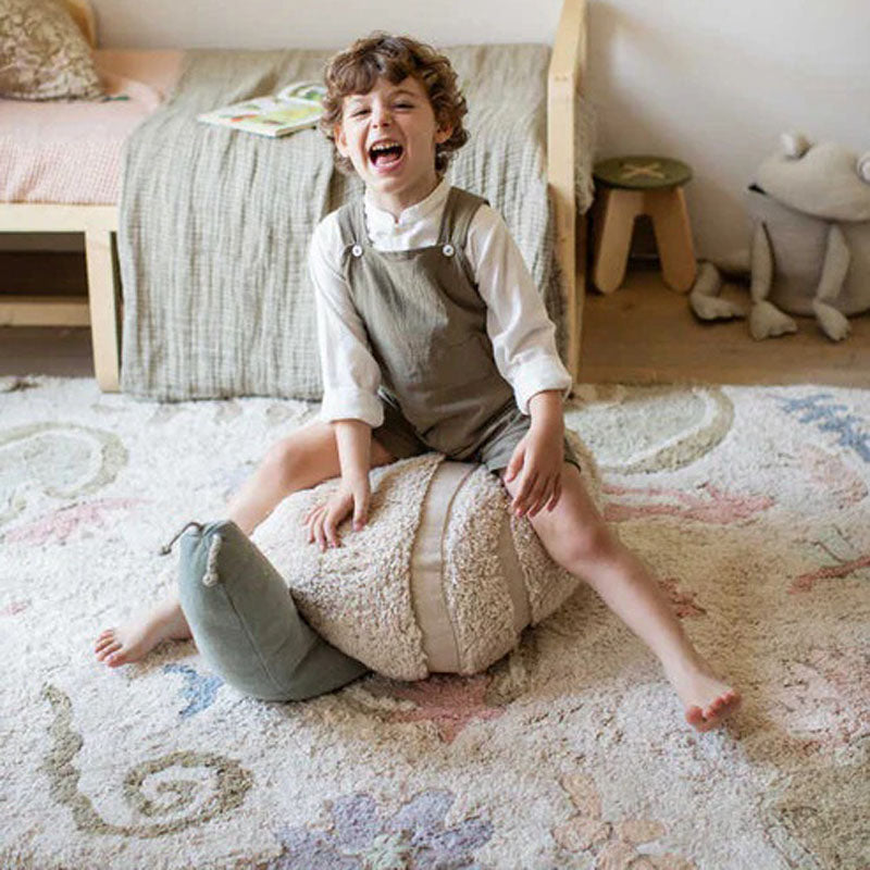 Mr. Snail Pouf by Lorena Canals, showing mr. snail pouf in live shot.