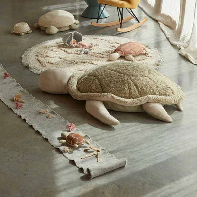 Pouf Kids Mrs. Turtle by Lorena Canals, showing pouf kids mrs. turtle in live shot.