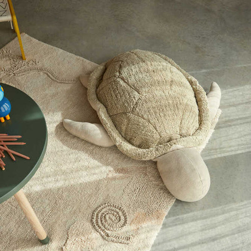 Pouf Kids Mrs. Turtle by Lorena Canals, showing pouf kids mrs. turtle in live shot.