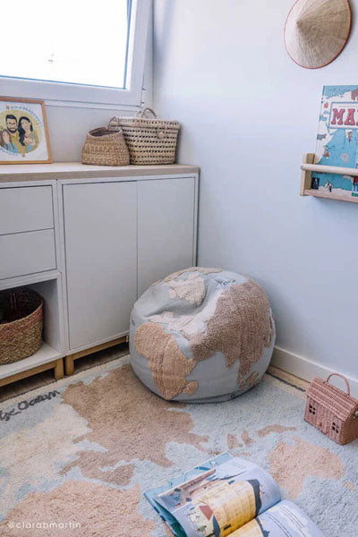 Filler Pouf by Lorena Canals, showing filler pouf rug in live shot.