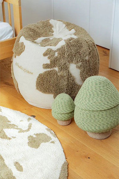 Filler Pouf by Lorena Canals, showing filler pouf rug in live shot.