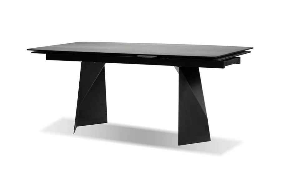 Prism Extending Dining Table by Mobital, showing angle view of prism extending dining table in industrial grey ceramic/black powder coated without extended.