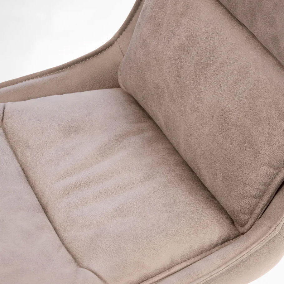 Puccini Swivel Dining Chair by Mobital, showing closeup view of puccini swivel dining chair in live shot.