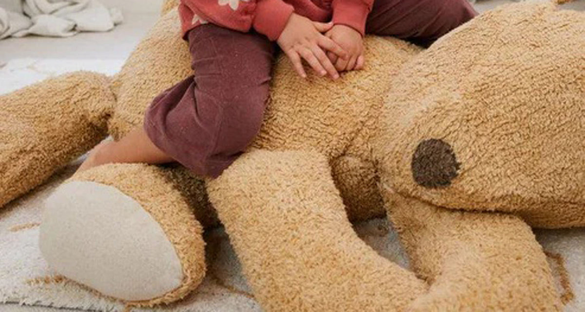 Bear Sleepy Pouf by Lorena Canals, showing bear sleepy pouf in live shot.