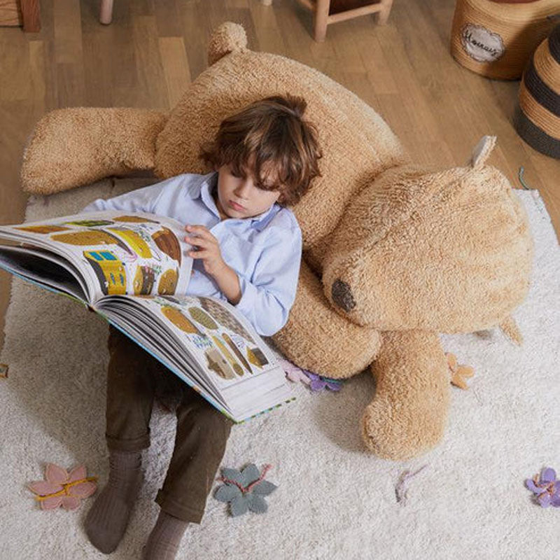 Bear Sleepy Pouf by Lorena Canals, showing bear sleepy pouf in live shot.