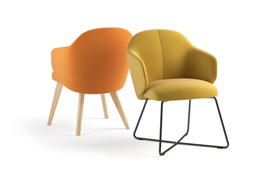 Quinta Metal Armchair by Kollektiff, showing angle view of quinta metal armchair in black painted metal.