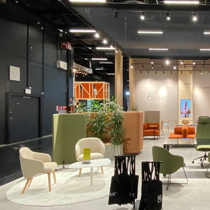 Quinta Wood Armchair by Kollektiff, showing quinta wood armchairs in live shot.