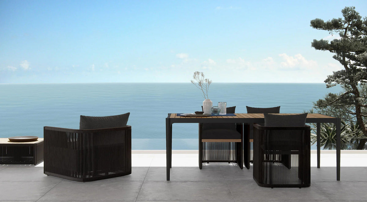 Ravelle Outdoor Dining Table by Viesso, showing ravelle outdoor dining table in live shot.