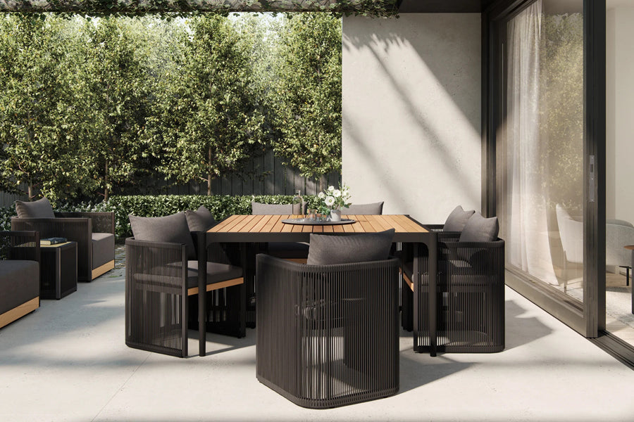 Ravelle Outdoor Dining Table by Viesso, showing ravelle outdoor dining table in live shot.