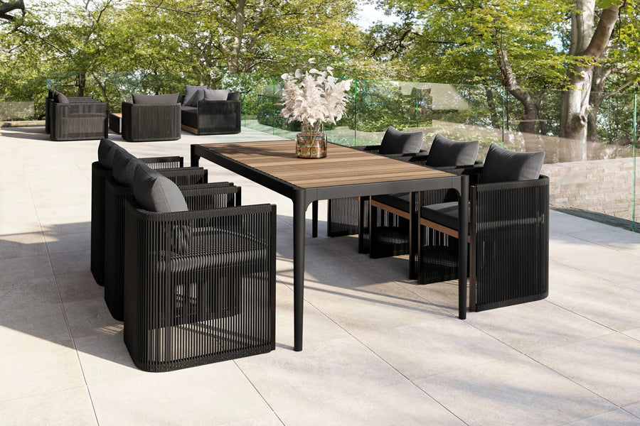 Ravelle Outdoor Dining Table by Viesso, showing ravelle outdoor dining table in live shot.
