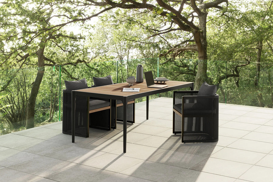 Ravelle Outdoor Dining Table by Viesso, showing ravelle outdoor dining table in live shot.