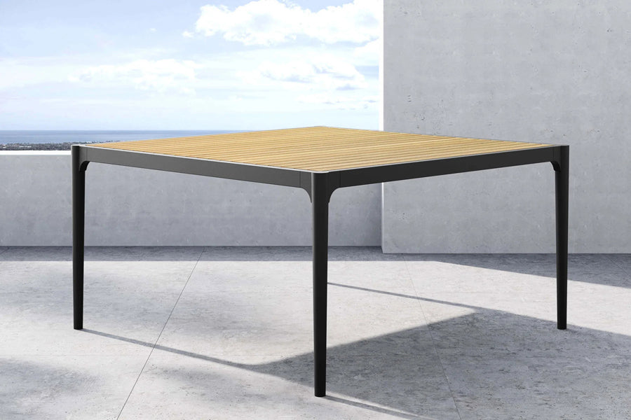 Ravelle Outdoor Dining Table by Viesso, showing ravelle outdoor dining table in live shot.