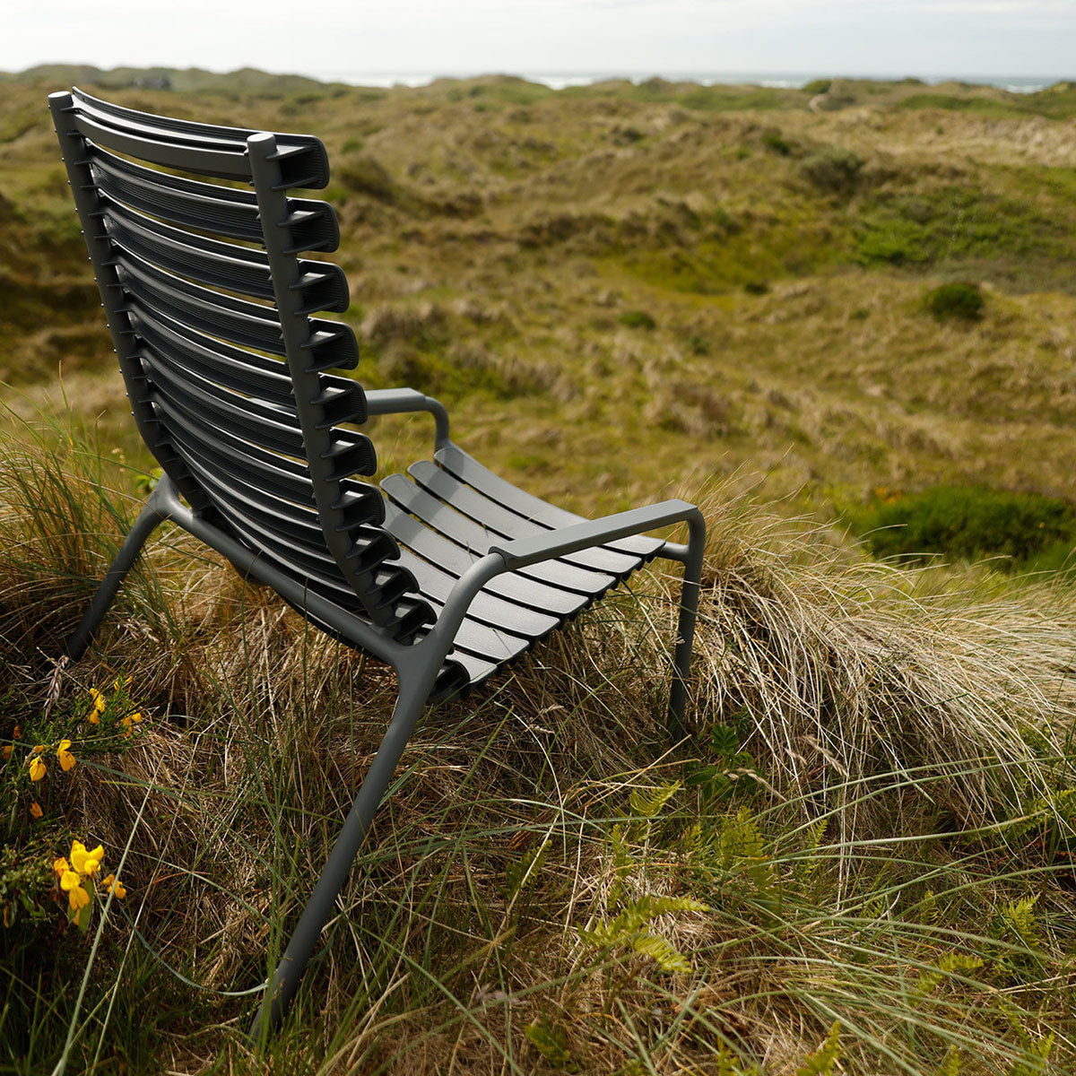 Reclips Outdoor Lounge Chair by Houe, showing reclips outdoor lounge chair in live shot.