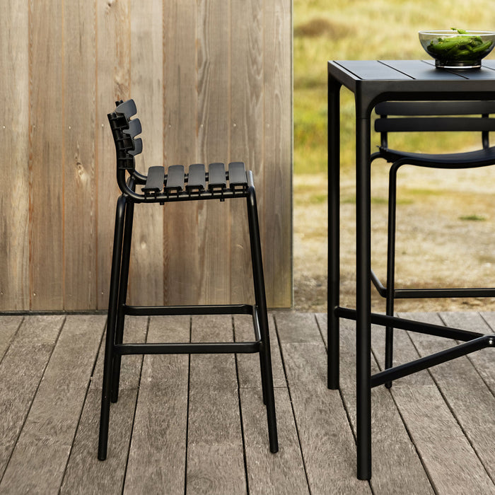 Reclips Stool by Houe, showing reclips stools in live shot.