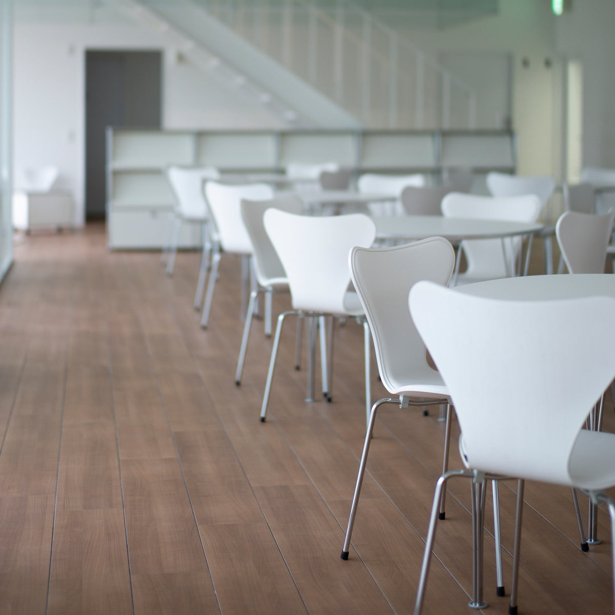 Rectangular Table by Fritz Hansen, showing rectangular tables in live shot.