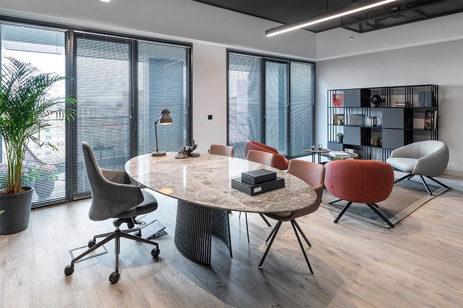 Rego Ellipse Swivel Armchair by B&T, showing rego ellipse swivel armchairs in live shot.