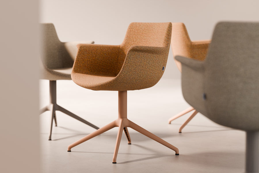 Rego Premium Swivel Armchair by B&T, showing rego premium swivel armchairs in live shot.