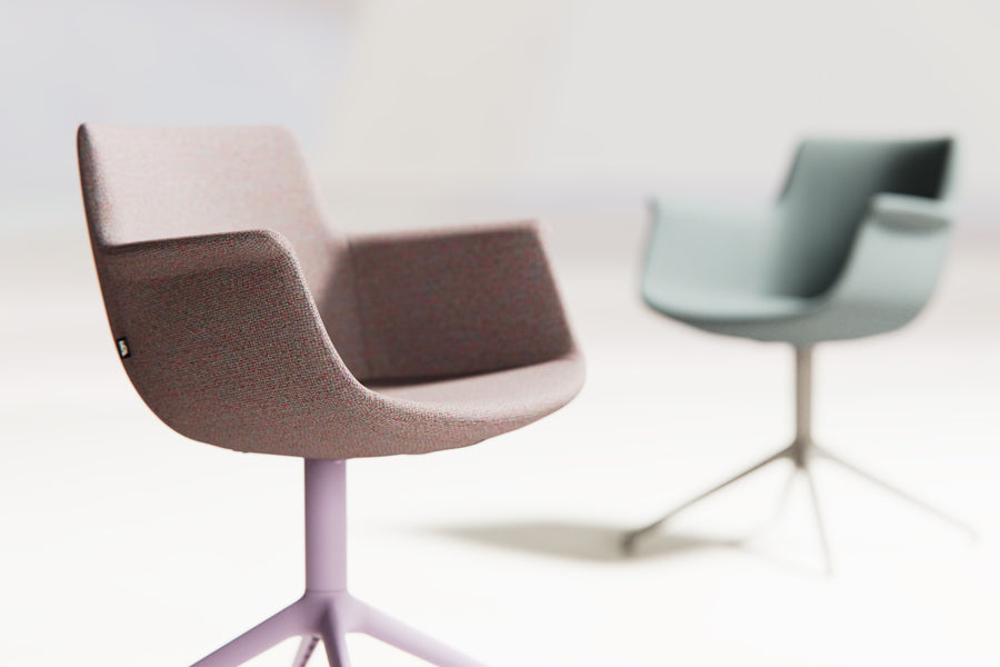 Rego Premium Swivel Armchair by B&T, showing closeup view of rego premium swivel armchairs in live shot.