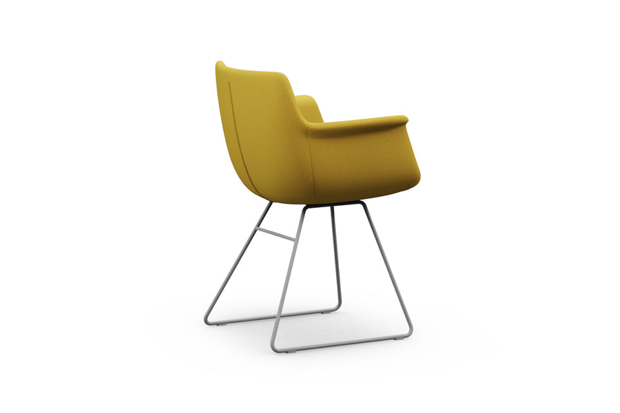 Rego Sled Armchair by B&T, showing side view of rego sled armchair in com/col group/metal group.