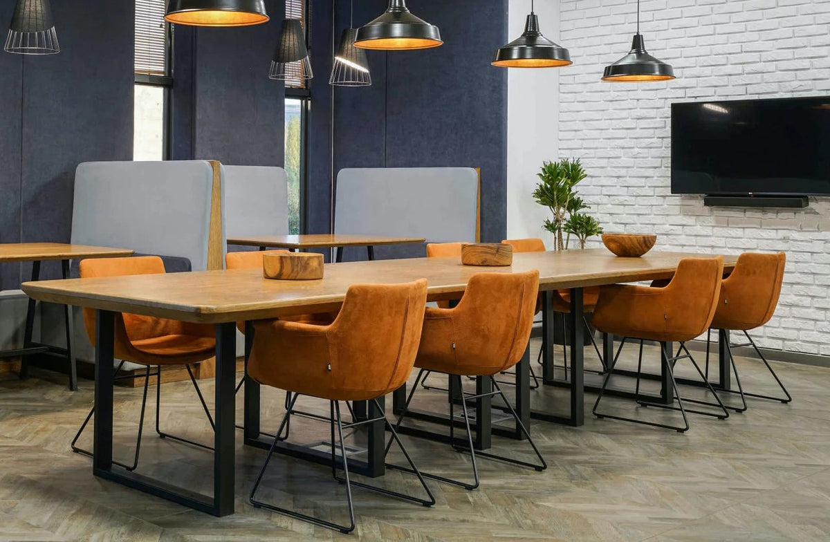 Rego Sled Armchair by B&T, showing rego sled armchairs in live shot.