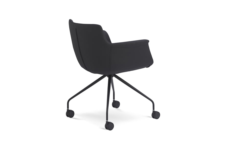 Rego Spider Swivel Armchair by B&T, showing side view of rego spider swivel armchair in leather group/metal group.