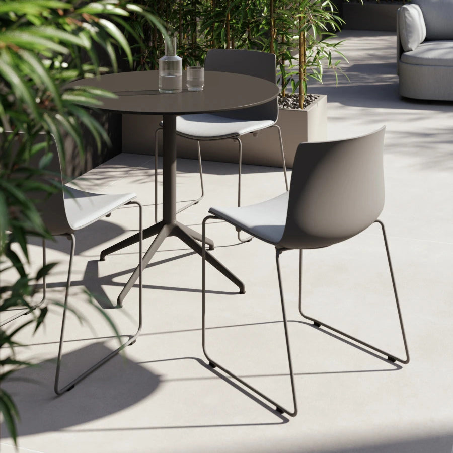 Rest Outdoor Sled Chair by B&T, showing rest outdoor sled chairs in live shot.