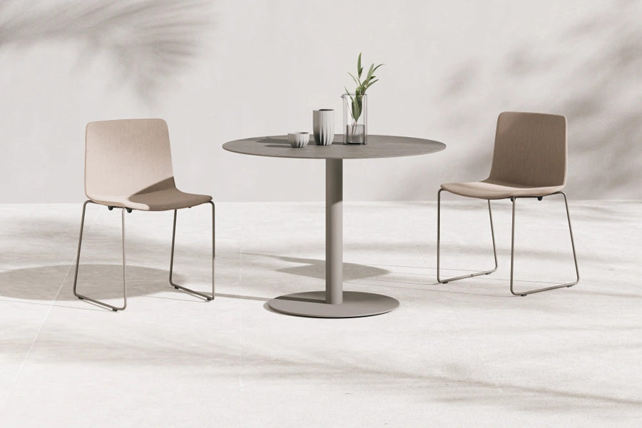 Rest Outdoor Sled Chair by B&T, showing rest outdoor sled chairs in live shot.