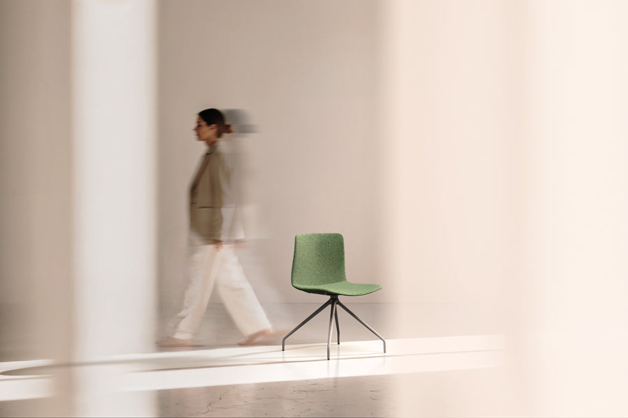 Rest Spider Swivel Guest Chair by B&T, showing rest spider swivel guest chair in live shot.