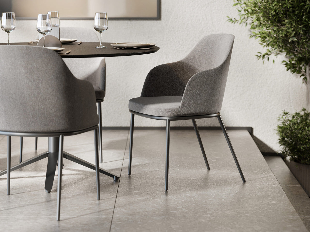 Rhone Conic Legs Armchair by Kollektiff, showing rhone conic legs armchairs in live shot.
