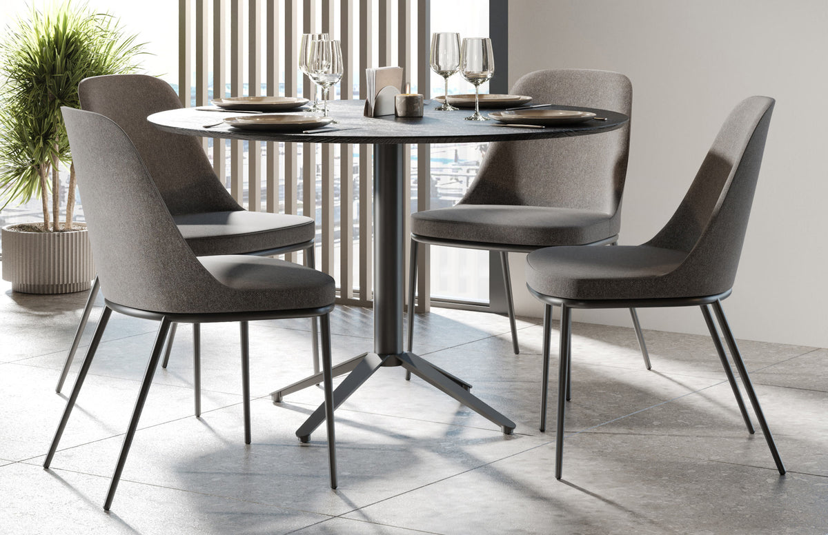 Rhone Conic Legs Armless Chair by Kollektiff, showing rhone conic legs armless chairs in live shot.