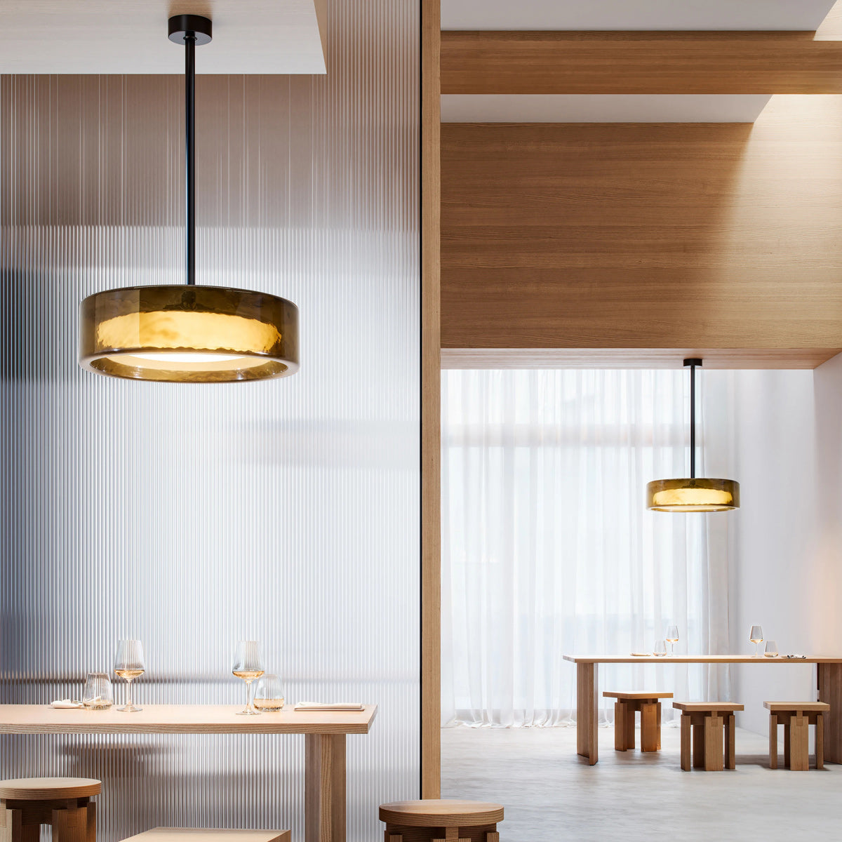 Ringo Fixed Stem Ceiling/Pendant Light by Marset, showing ringo fixed stem ceiling/pendant lights in live shot.