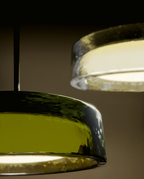 Ringo Fixed Stem Ceiling/Pendant Light by Marset, showing closeup view of ringo fixed stem ceiling/pendant lights in live shot.